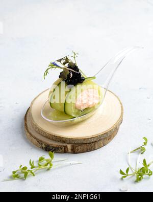 cucumber canape with cheese and caviar. High quality photo Stock Photo