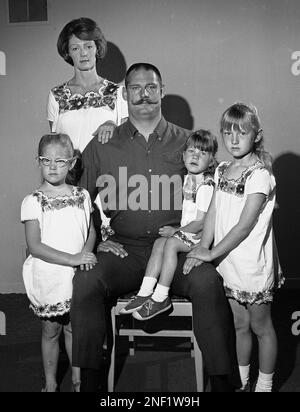 Oakland Raider's defensive lineman Ben Davidson, with his now famous  handlebar mustache, poses with his family in an 1890-type Father's Day  portrait, June 14, 1968 at their Hayward, California home. From left: