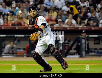 The Houston Astros' Ivan Rodriguez beat the throw to Minnesota Twins catcher  Joe Mauer to tie the game in the seventh inning. The Astros defeated the  Twins, 6-5, at the Metrodome in