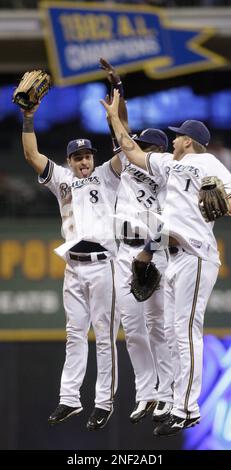 Milwaukee Brewers' Mike Cameron (25), Gabe Kapler, center, and Ryan Braun  celebrate after the ninth inning of a baseball game against the Minnesota  Twins Sunday, June 15, 2008, in Milwaukee. The Brewers