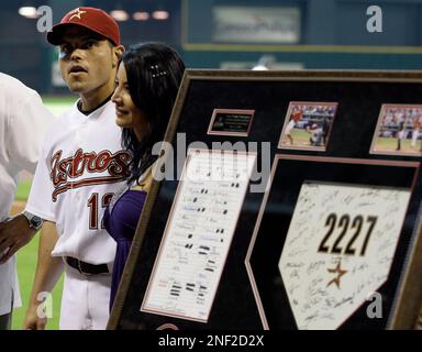 The Houston Astros' Ivan Rodriguez beat the throw to Minnesota Twins catcher  Joe Mauer to tie the game in the seventh inning. The Astros defeated the  Twins, 6-5, at the Metrodome in