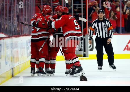 Los Angeles, California, USA. 3rd Dec, 2022. SETH JARVIS and SEBASTIAN AHO  of the NHL's Carolina Hurricanes collects celebrate a goal during a game  against the Los Angeles Kings at Crypto.com Arena