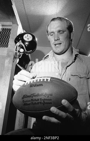 Terry Bradshaw, who quarterbacked the Pittsburgh Steelers to a 24-13  victory over the Oakland Raiders in the AFC championship game in Oakland,  Dec. 29, 1974, answers a question in the dressing room