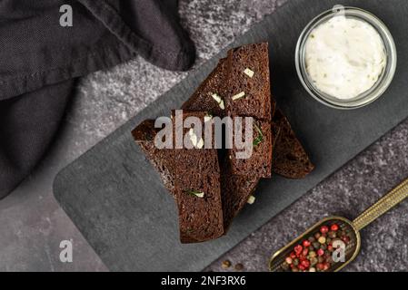 garlic bread croutons on a blackboard. High quality photo Stock Photo
