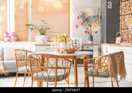 Interior of kitchen with beautiful Easter decor Stock Photo