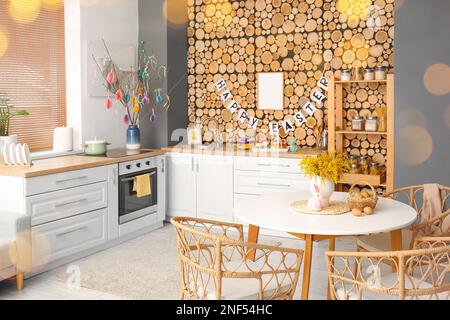 Interior of kitchen with beautiful Easter decor Stock Photo