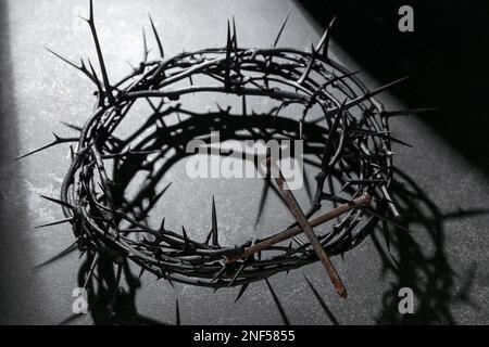 Crown of thorns with nails on dark background. Good Friday concept Stock Photo