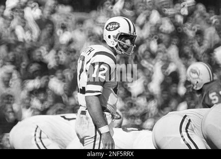 Joe Namath of the New York Jets, #12 in green shirt, during game against  the Houston Oilers, Nov. 1965. (AP Photo Stock Photo - Alamy