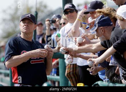 Former Atlanta Braves player Dale Murphy tips his hat to cheering fans  before a spring baseball exhibition game against the Miami Marlins, Friday,  March 15, 2019, in Kissimmee, Fla. (AP Photo/John Raoux