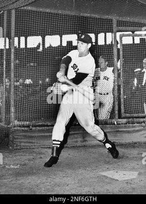 Fenway Park, Boston, MA, July 4, 1947 – Red Sox great Ted Williams in left  field with the freshly painted Green Monster behind him