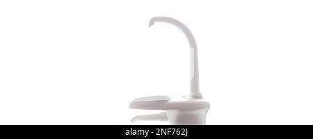 Dental Spittoon and glass sink. Washbasin in dentist cabinet. Spit sink at dentisl office. Stomatological equipment. Stock Photo