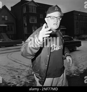 FILE - This Jan. 18, 1947, file photo shows Chicago Bears owner and coach  George Halas, left, watching as Bob Fenimore signs a contract with the Bears.  Halas left the Bears in