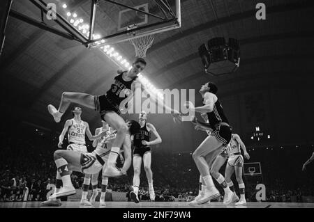 FILE - In this Dec. 31, 1967, file photo, players spill in all