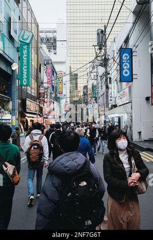 Crowds wandering through a backstreet in Akihabara in Tokyo, Japan. Stock Photo