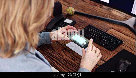 Remote Check Deposit Using Mobile Remote. Online Capture Stock Photo