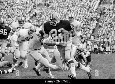 Green Bay Packers Elijah Pitts (22) moves for small gain against Detroit  Lions in a season opener, Sept. 18, 1967, Green Bay, Wisc. Lions Wayne  Walker (55) and some of his buddies