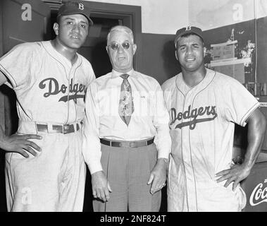 Pee Wee Reese poses with Pete Reiser at Ebbets Field in Brooklyn in 1949.