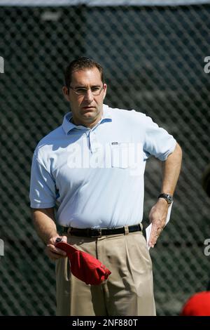 St. Louis Cardinals General Manager John Mozeliak presents catcher