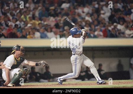 Toronto Blue Jays' Rickey Henderson celebrates after scoring the winning  run on a Devon White triple in Game 4 of the World Series against the  Philadelphia Phillies on Oct. 20, 1993, in