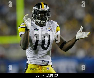 Super Bowl MVP Pittsburgh Steelers Santonio Holmes holds the Vince Lombardy  Trophy after his team defeated the Arizona Cardinals 27-23 at Super Bowl  XLIII at Raymond James Stadium in Tampa, Florida, on