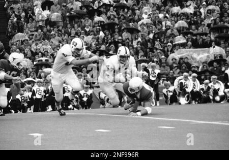 https://l450v.alamy.com/450v/2nf996r/texas-university-quarterback-eddie-philips-didnt-have-much-success-in-escaping-the-penn-state-defenders-in-the-cotton-bowl-new-years-day-in-the-upper-photo-penn-states-jim-laslavic-47-right-end-removes-most-of-phillips-jersey-in-the-lower-photo-laslavic-manages-to-get-phillips-down-before-the-hard-charging-left-end-bruce-bannon-83-arrived-on-the-scene-the-penn-state-lions-defeated-the-texas-university-of-longhorns-30-6-jan-3-1972-in-dallas-ap-photo-2nf996r.jpg