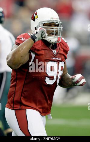 Arizona Cardinals tackle Gabe Watson looks up at the scoreboard in