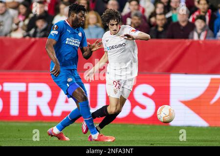 Sevilla, Spain - February 16, 2023, Ibrahim Sangare of PSV Eindhoven and Bryan Gil of Sevilla FC during the UEFA Europa League, Play-off, 1st leg football match between Sevilla FC and PSV Eindhoven on February 16, 2023 at Estadio Ramon Sanchez Pizjuan in Sevilla, Spain - Photo: Joaquin Corchero / SpainDPPI / DPPI/LiveMedia Stock Photo