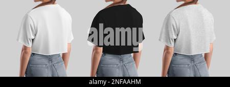 Mockup of a white, black, heather cropped t-shirt for a girl, shirt for design, advertising, back view. Template of fashion crop top, textured apparel Stock Photo