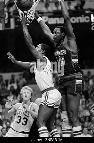 Philadelphia 76ers Moses Malone, white uniform, guard Milwaukee Bucks Bob  Lanier during second quarter NBA Eastern Conference finals action at  Philadelphia, May 18, 1983. (AP Photo/Rusty Kennedy Stock Photo - Alamy