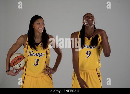 Los Angeles Sparks players Candace Parker, left, and Lisa Leslie, right,  embrace as they met at a Sparks team advertising photo shoot at the Staples  Center in Los Angeles Friday, April 11