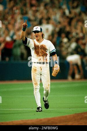 Toronto Blue Jays third baseman Kelly Gruber, right, congratulates relief  pitcher Tom Henke after Henke saved Game 4 of the World Series against the  Atlanta Braves at SkyDome in Toronto, Oct. 22