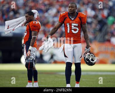 Denver Broncos wide receivers, from left, Travis Shelton, Eddie Royal,  Brandon Marshall, Chad Jackson, Brandon Stokley and Jabar Baffney joke with  photographers during a break in drills at NFL football training camp