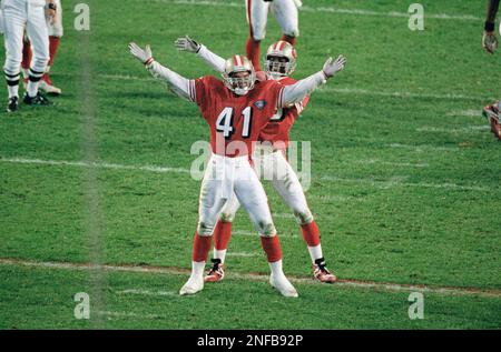 San Francisco 49ers Toi Cook (41) and Merton Hanks dance as they celebrate  in the fourth quarter of Super Bowl XXIX as the 49ers headed to a 49-26  victory over the San