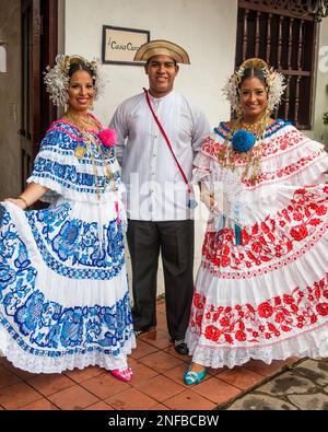 Two Panamanian women wearing the colorful traditional pollera, the ...