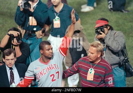 Cincinnati Reds pitcher Jose Rijo hugs his wife, Rosie Rijo, and his son, Jose  Rijo Jr. on the field after the World Series win, Saturday, Oct. 20, 1990,  Oakland, Calif. Rijo was