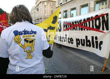 A demonstrator for the postal public service La Poste seen in