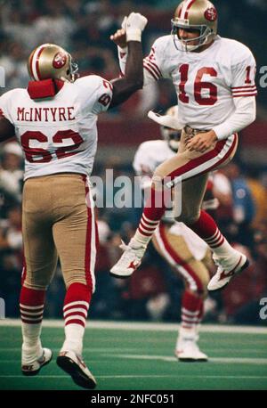 28 Jan 1990: Quarterback Joe Montana of the San Francisco 49ers is chased  during the 49ers 55-10 victory over the Denver Broncos in Super Bowl XXIV  at the Louisiana Superdome in New