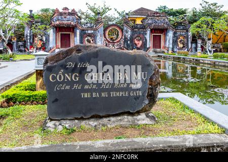 Tam quan is an entrance gate to Ba Mu Temple in Hoi An, Vietnam. Stock Photo