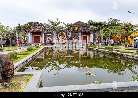 Tam quan is an entrance gate to Ba Mu Temple in Hoi An, Vietnam. Stock Photo