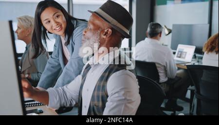 Business, manager training employee and conversation for system process, schedule and office. Black man, Asian woman and discussion for new trainee Stock Photo