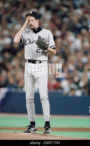 Toronto Blue Jays Rickey Henderson hit a home run off Oakland Athletics  pitcher Ron Darling as A's catcher Scott Hemond watches the play in the  fifth inning at Oakland, Aug. 30, 1993.