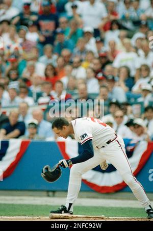 Atlanta Braves batter David Justice walks away talking after he was called  out on strikes by homeplate umpire Bob Davidson in the ninth inning of Game  5 of the National League playoffs