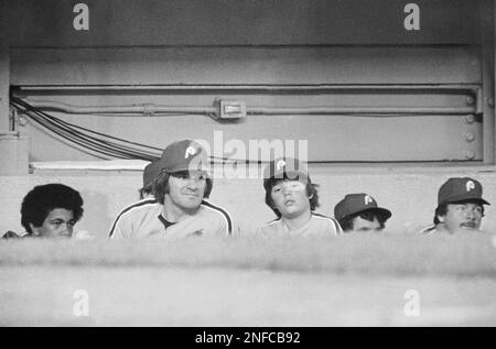 Philadelphia Phillies first baseman Pete Rose looks over a children's book  by teammate Tug McGraw as he sits in the club's locker room at Jack Russell  Stadium in Clearwater, Fla., March 10