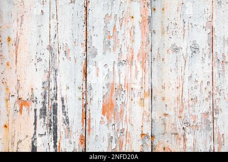 Wooden background. White peeling paint wooden planks texture. Grunge wood vintage style background. Stock Photo