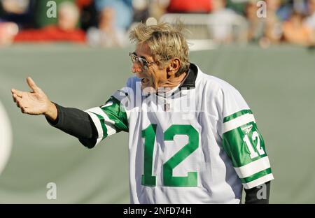 New York Jet quarterback Joe Namath stands with bowed head after being  injured in the first quarter of the Jets-Colt game at Memorial Stadium on  Sept. 23, 1973, in Baltimore, Maryland. Namath