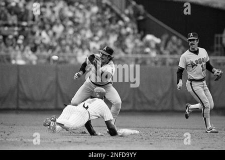 Milwaukee Brewers Paul Molitor, left, Jim Slaton, center, and Jim Gantner  embrace on the mound after their 9-5 win over the California Angels tied  the American League playoff series at two games