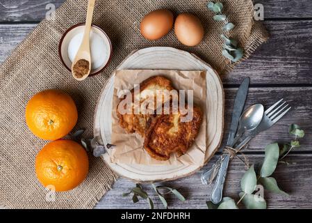 Torrijas. View from the top of the typical Spanish sweet made of bread, milk, sugar, eggs, cinnamon and orange zest that is consumed at Easter Stock Photo
