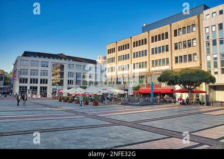 ESSEN, GERMANY - SEPTEMBER 20, 2020: People visit Kennedyplatz city square in Essen, Germany. Essen is the 9th biggest city in Germany. Stock Photo