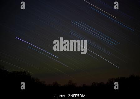 Time interval of stars in the night sky. Stock Photo