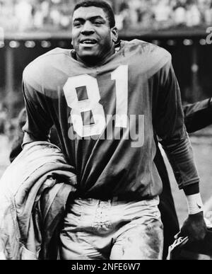 Dick Night Train Lane of the Detroit Lions, leaves the field at Briggs  Stadium in Detroit, Mich., Oct. 23, 1960, after intercepting a Johnny  Unitas pass in closing minutes of game and